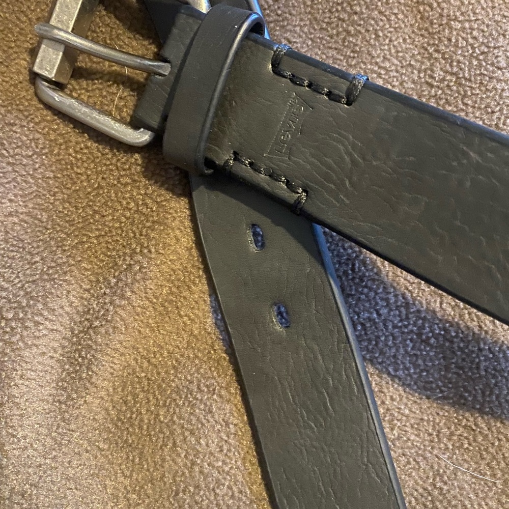 Levi’s charcoal gray belt 42–44. New